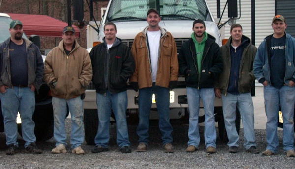The P&S Electric crew in front of a company truck